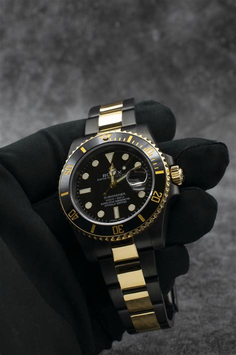 gold rolex black band|black rolex price.